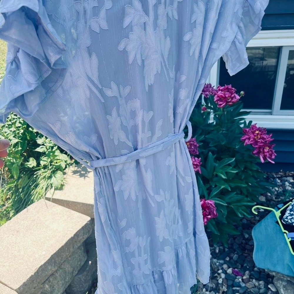 Blue floral maxi dress with tie waist and ruffle sleeves